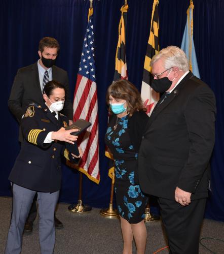 Award being presented to Amy Caprio's family